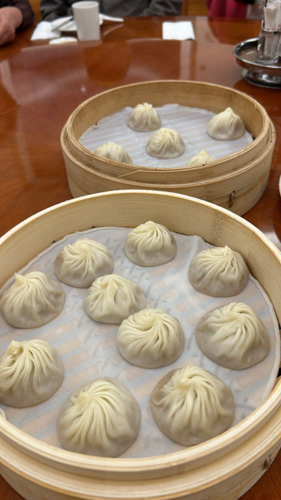 Xiao long bao soup dumplings in bamboo steamers