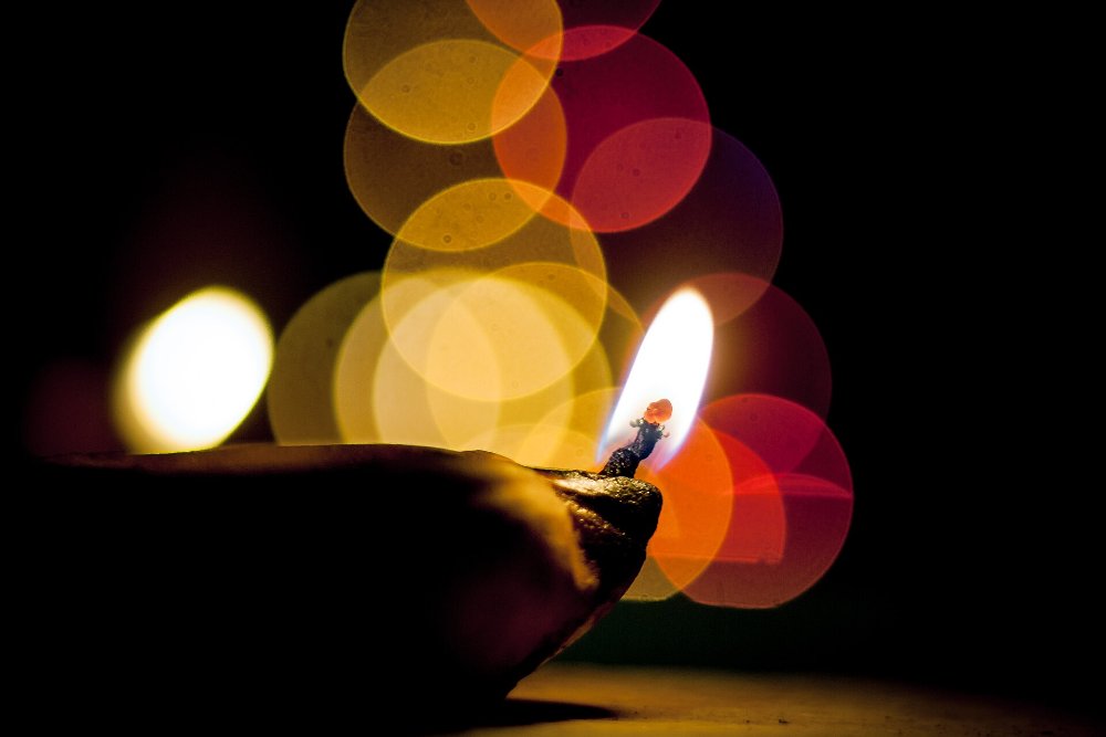 Clay diya oil lamps lit for Diwali