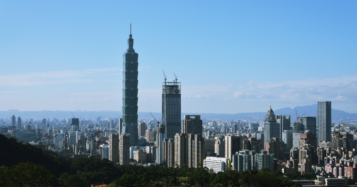 Taipei city skyline with Taipei 101 under a clear sky